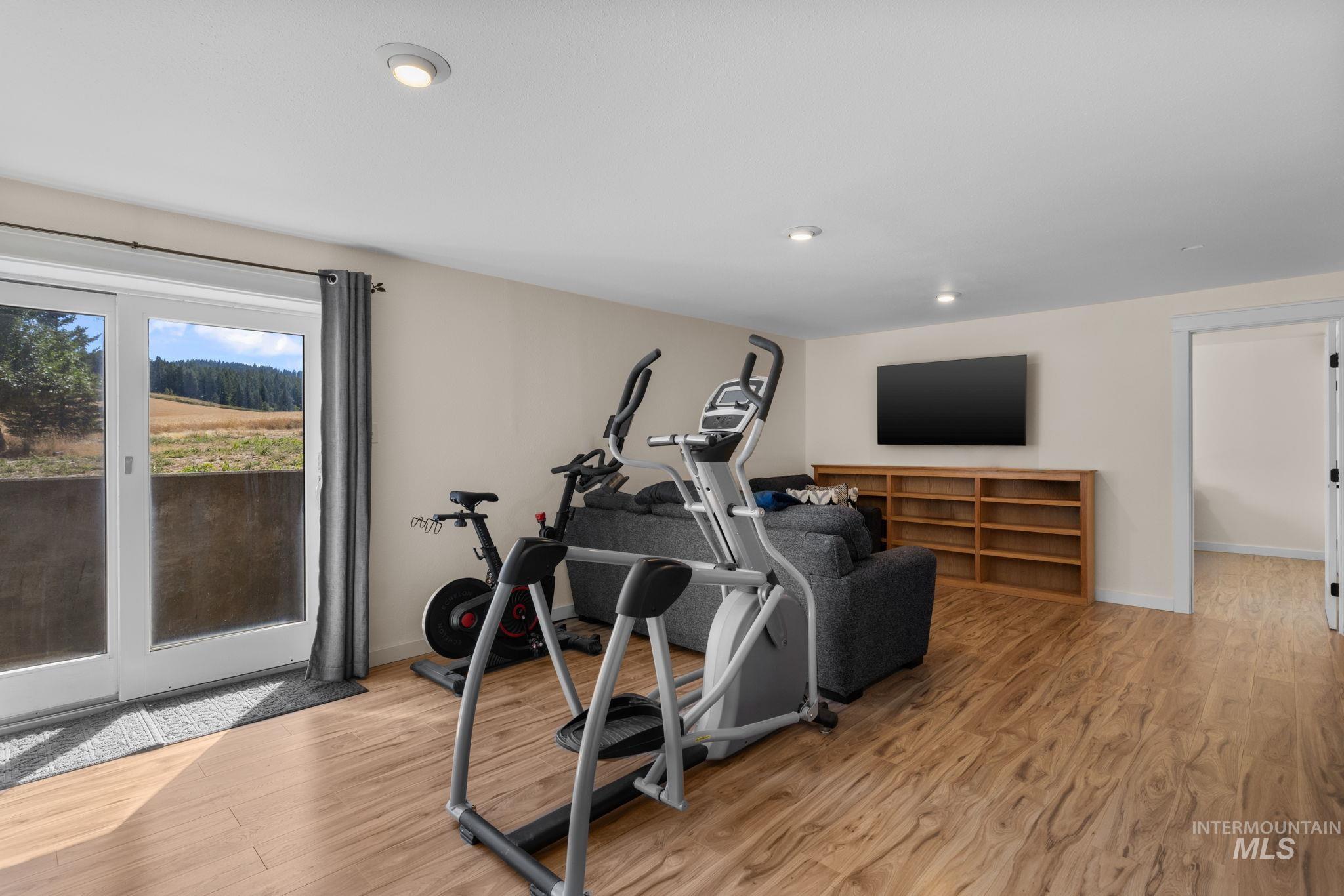 1199 Walker Road Viola, ID 83872 - Photo 25 of 50 Workout room with light wood-style flooring and recessed lighting