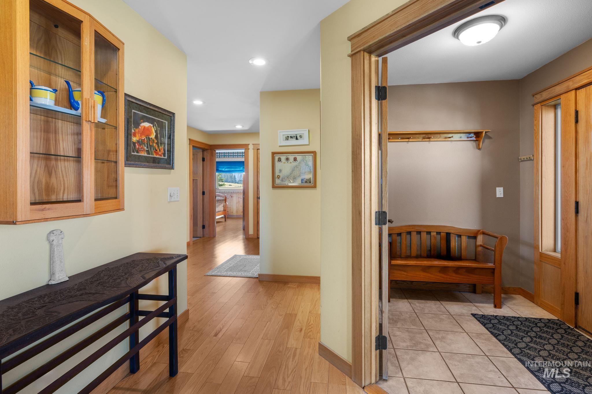 1199 Walker Road Viola, ID 83872 - Photo 5 of 50 Corridor with recessed lighting and light wood-type flooring