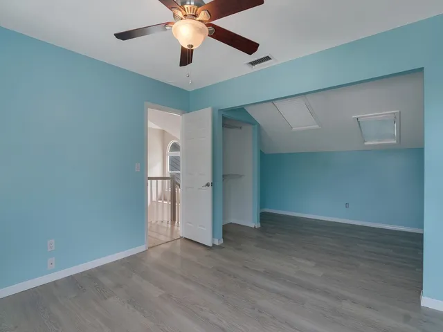 an aerial view of a house with swimming pool and outdoor space