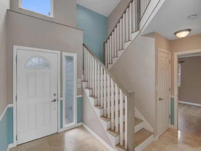a view of a livingroom with furniture and wooden floor