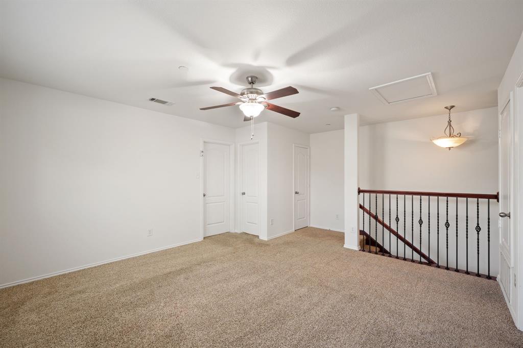 1013 Lucy Lane Allen, TX 75013 - Photo 24 of 30 a view of an empty room with a ceiling fan