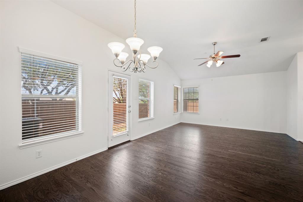 1013 Lucy Lane Allen, TX 75013 - Photo 8 of 30 a view of an empty room with wooden floor and a window