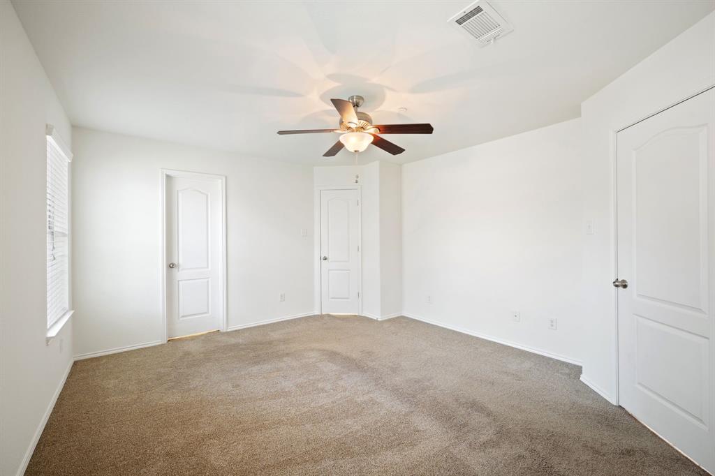1013 Lucy Lane Allen, TX 75013 - Photo 9 of 30 a view of a room with a ceiling fan