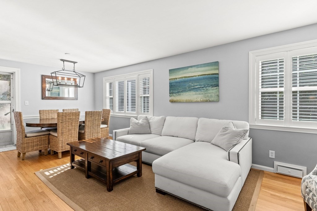 218 Scudder Road Barnstable, MA 02655 - Photo 2 of 36 a living room with furniture and a window