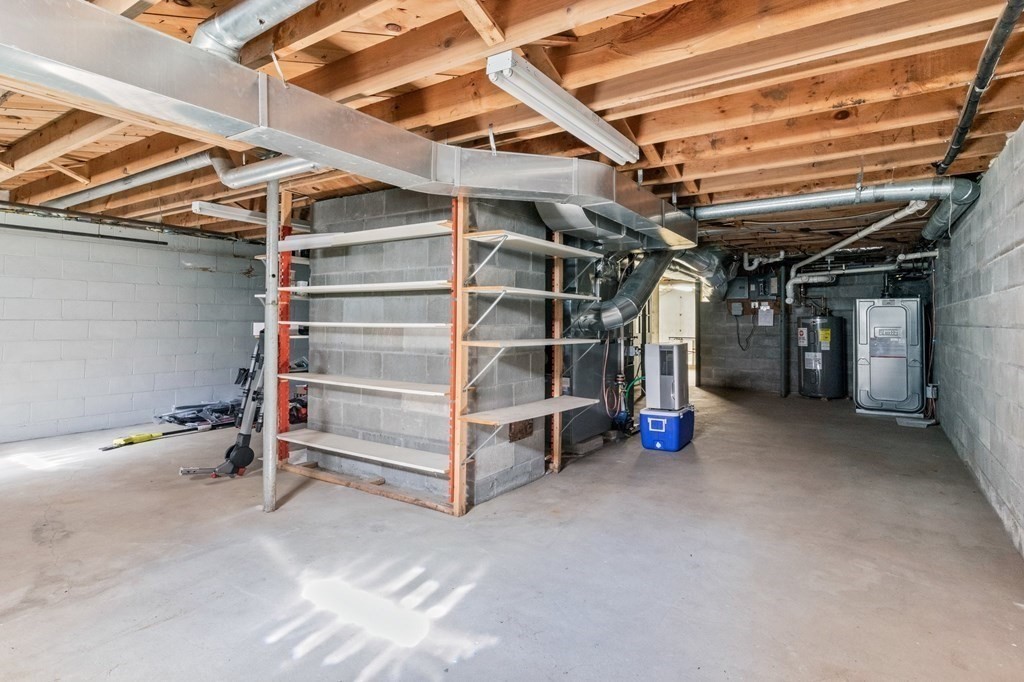 218 Scudder Road Barnstable, MA 02655 - Photo 23 of 36 a view of an empty room with storage