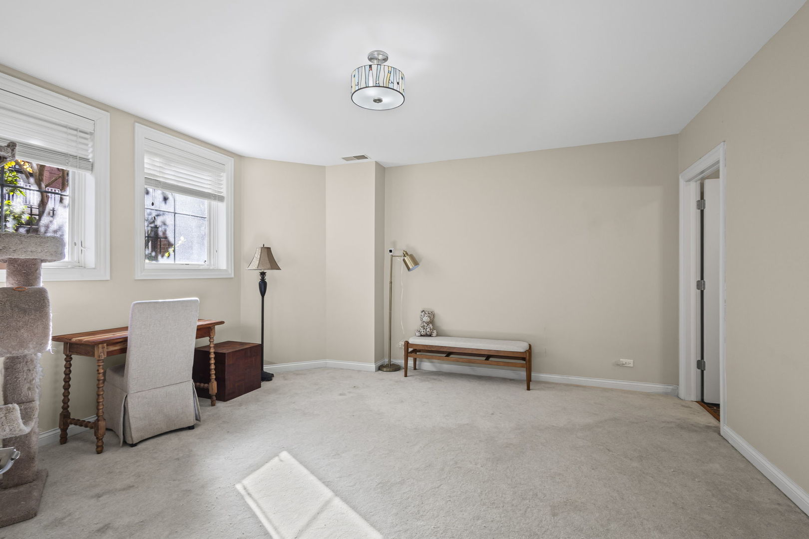 2005 Valor Court Glenview, IL 60026 - Photo 13 of 15 a view of a livingroom with furniture and windows
