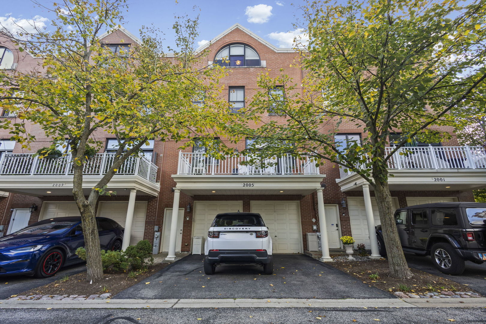 2005 Valor Court Glenview, IL 60026 - Photo 15 of 15 a front view of a building with parking
