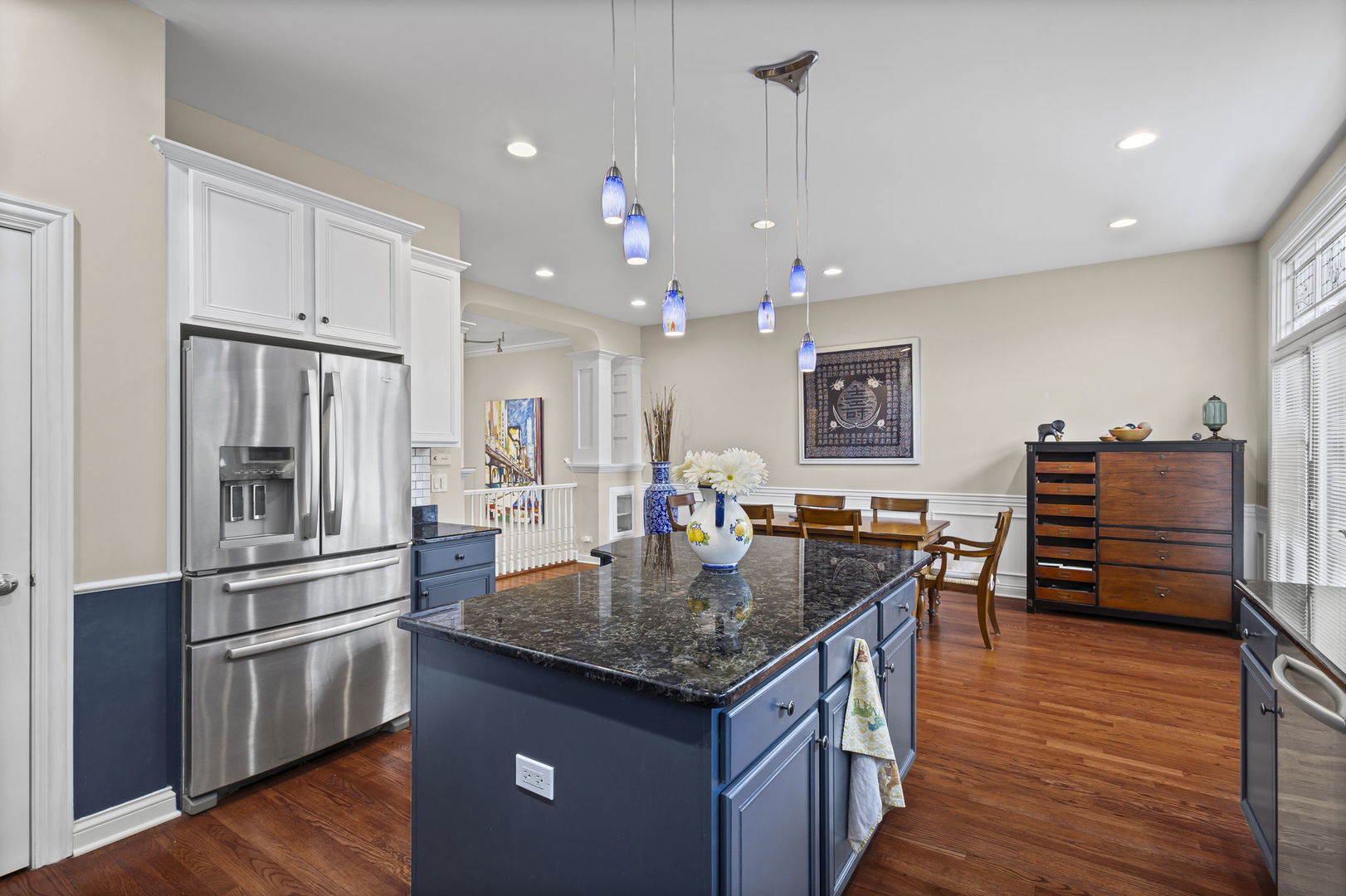 2005 Valor Court Glenview, IL 60026 - Photo 6 of 15 a kitchen with stainless steel appliances granite countertop a kitchen island a stove and a refrigerator
