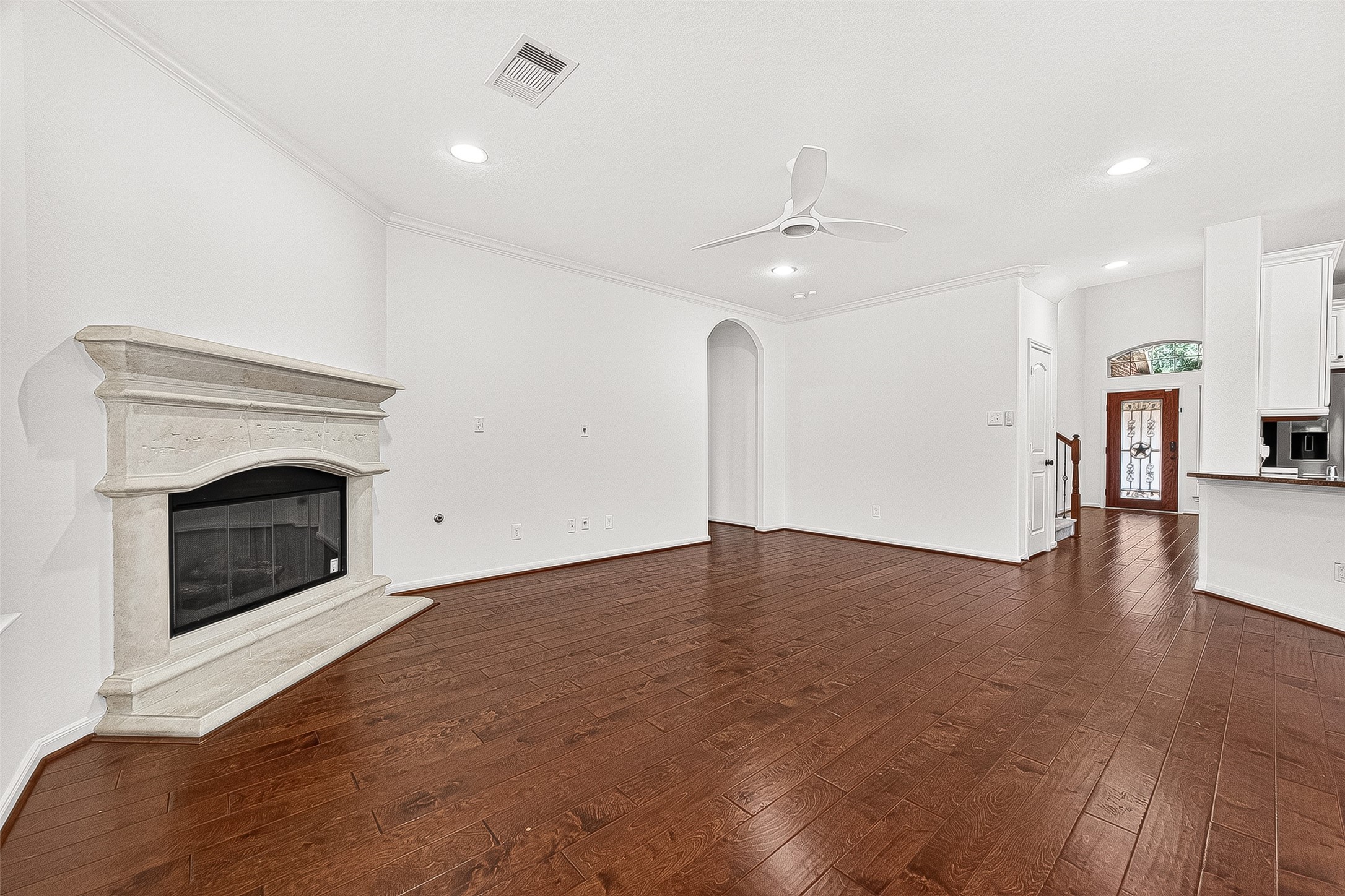 138 South Sawbridge Circle Spring, TX 77389 - Photo 11 of 37 a view of empty room with wooden floor and fireplace