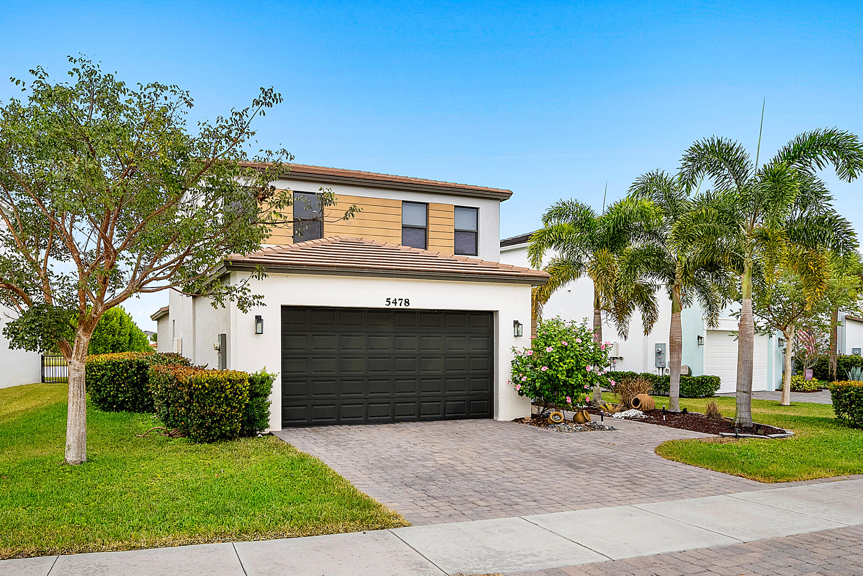 5478 Starfish Road Westlake, FL 33470 - Photo 2 of 51 002-5478StarfishRoad-Westlake-FL-33470-F