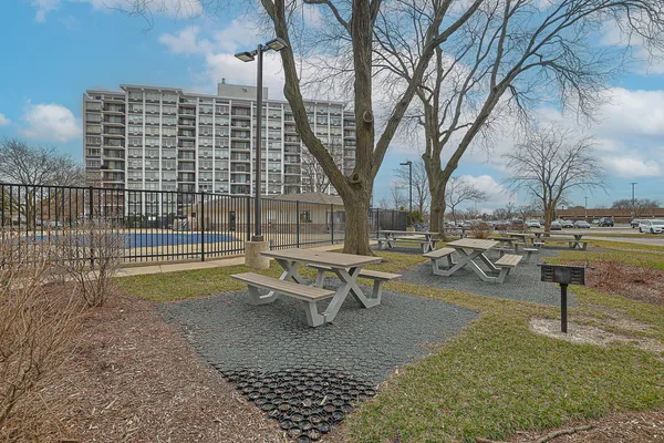 a view of a patio with a yard