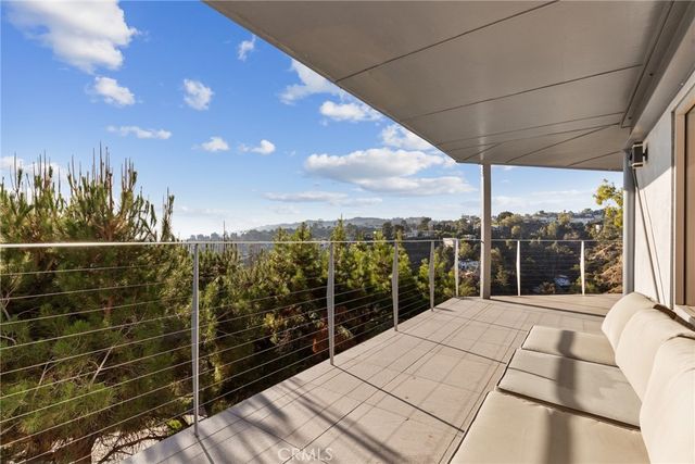 a kitchen with granite countertop a sink and cabinets