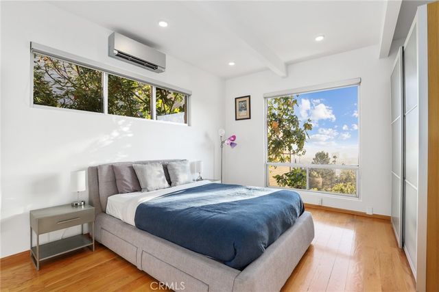 a view of a parking space with a building in the background