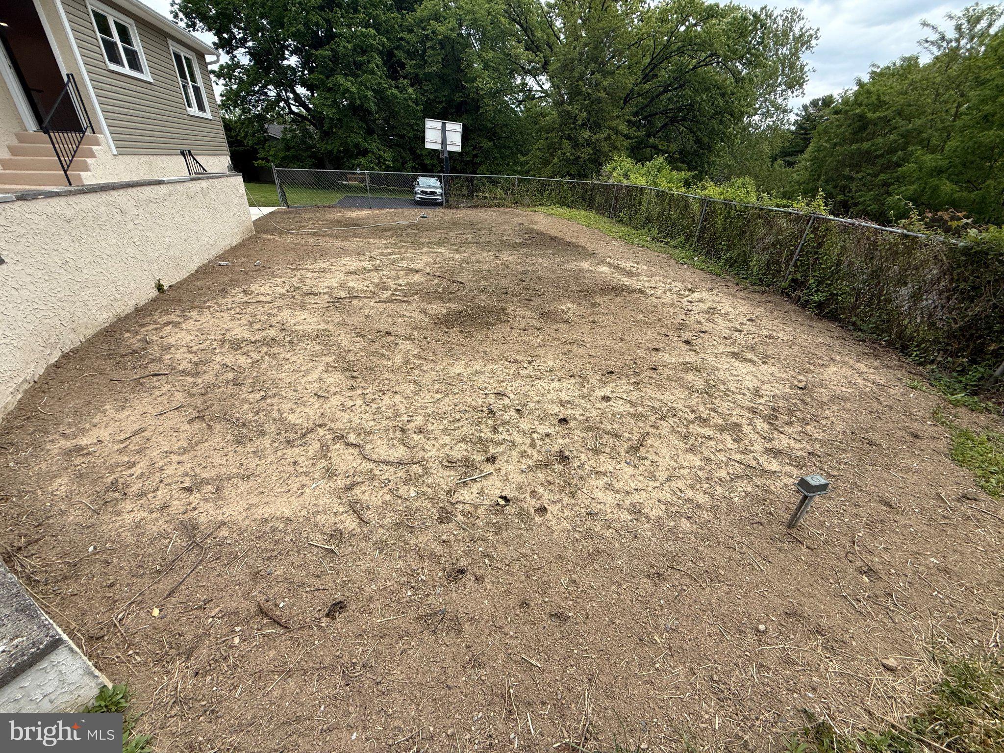 1104 Church Road Wyncote, PA 19095 - Photo 27 of 31 a backyard of a house with lots of green space