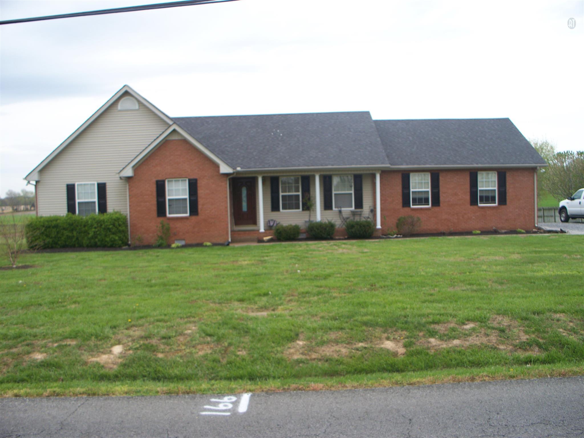 166 Cook Road Portland, TN 37148 - Photo 11 of 11 a front view of house with yard and green space