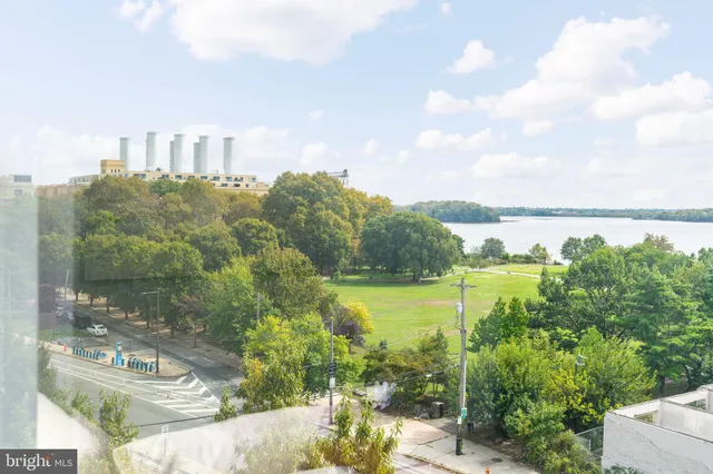 a view of a lake with a city