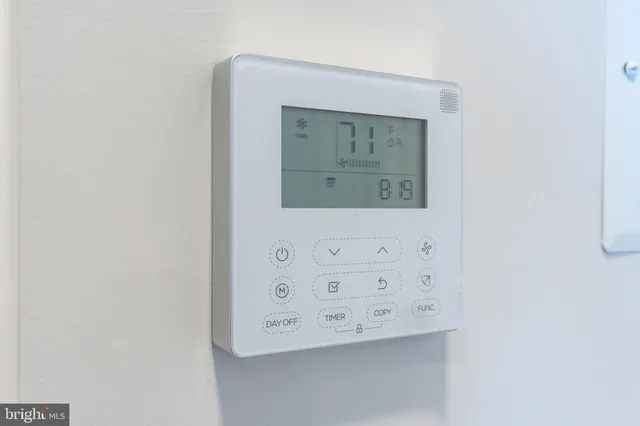 a close view of utility room with washer and dryer