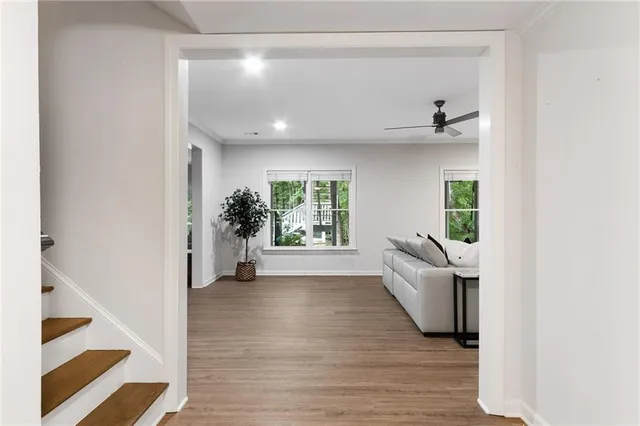 a view of livingroom with furniture wooden floor and window