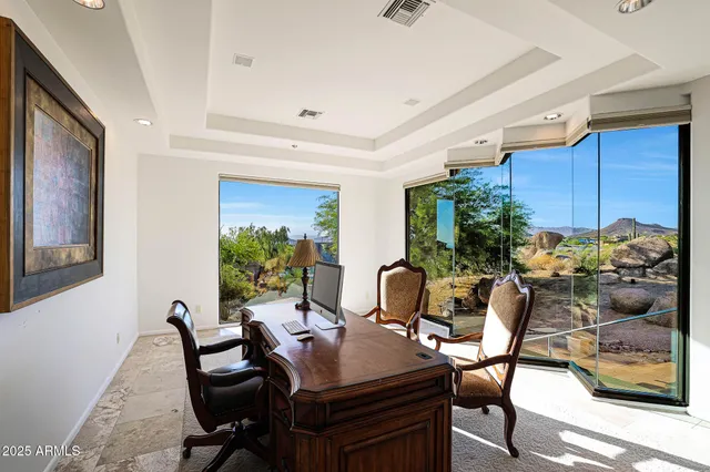 a bathroom with a tub a sink and a shower