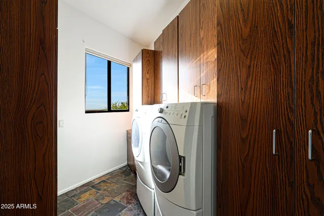 an aerial view of a house with a garden