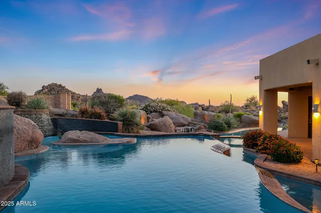 a view of a city with a lake