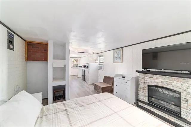 a view of a lake with houses in the back