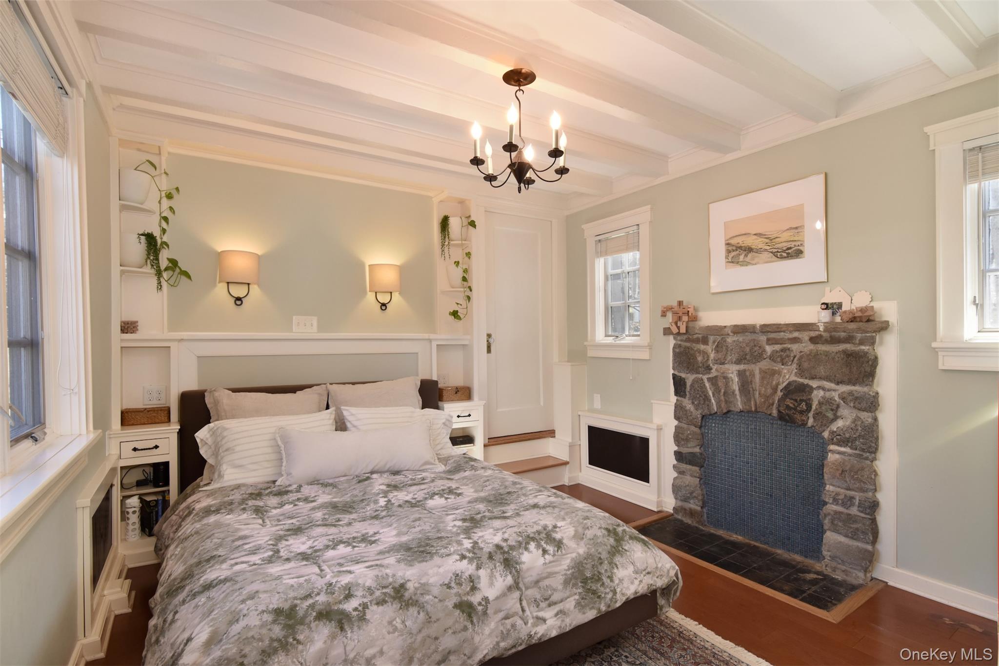 116 Potter Road Scarsdale, NY 10583 - Photo 15 of 38 Primary bedroom with faux fireplace and door to attic.