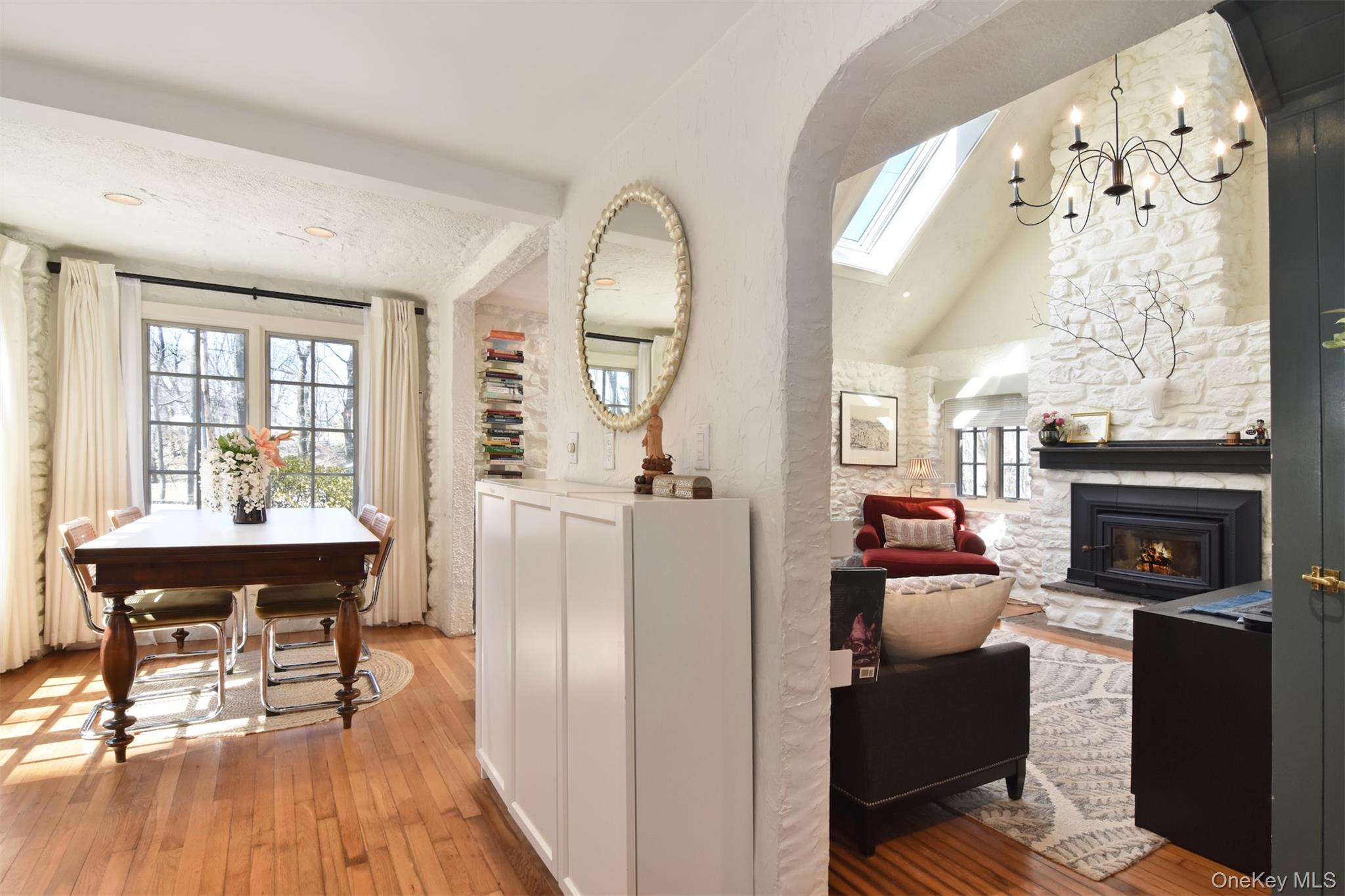 116 Potter Road Scarsdale, NY 10583 - Photo 8 of 38 Dining area view from the kitchen with an arch into the living room.
