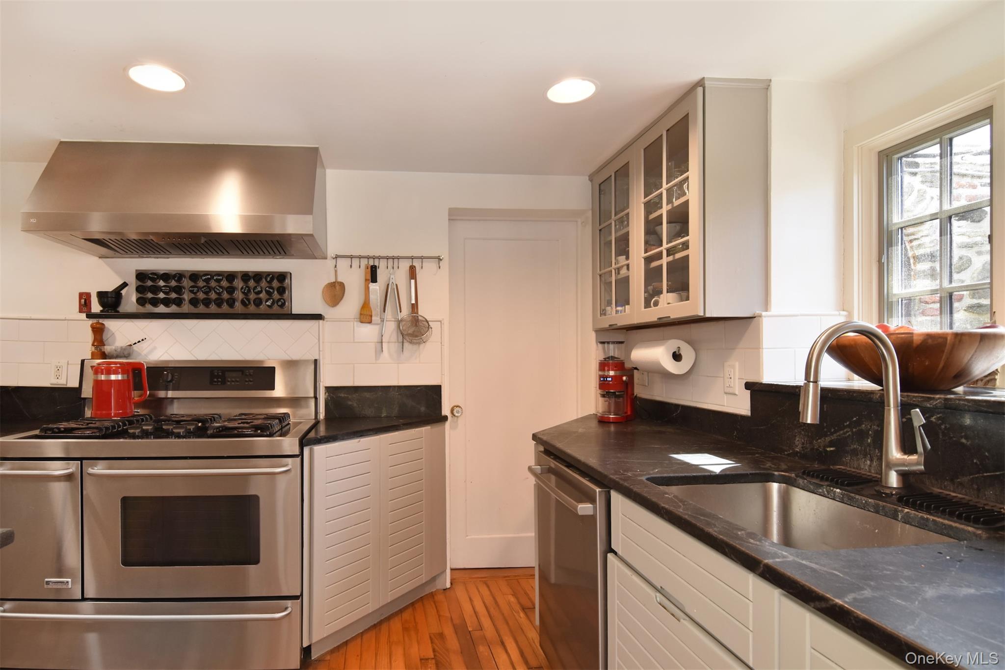 116 Potter Road Scarsdale, NY 10583 - Photo 9 of 38 Kitchen with stainless steel appliances and soapstone counters.
