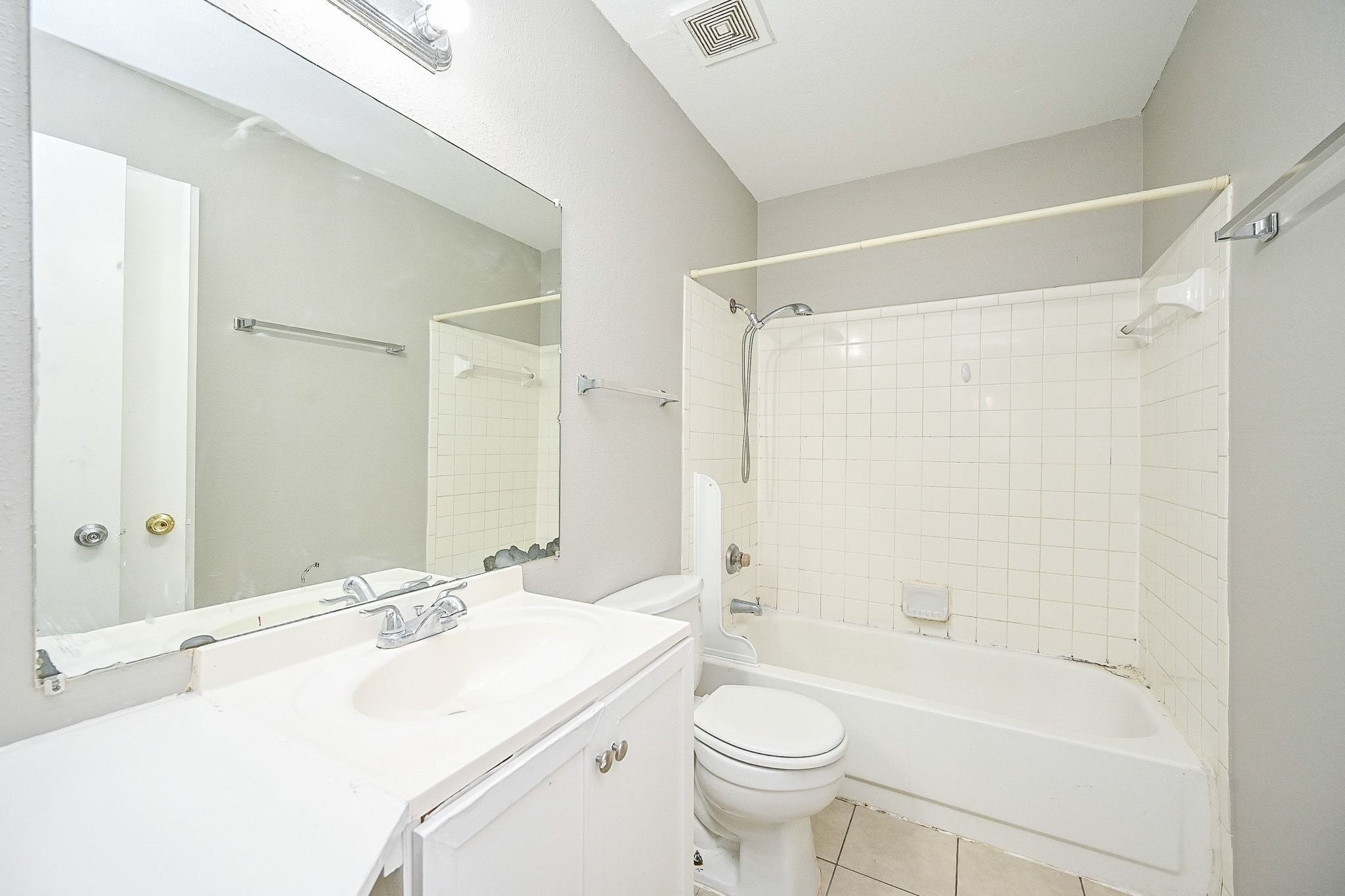 16303 Lyons School Road, Unit 703 Spring, TX 77379 - Photo 12 of 19 a bathroom with a sink toilet tub and shower