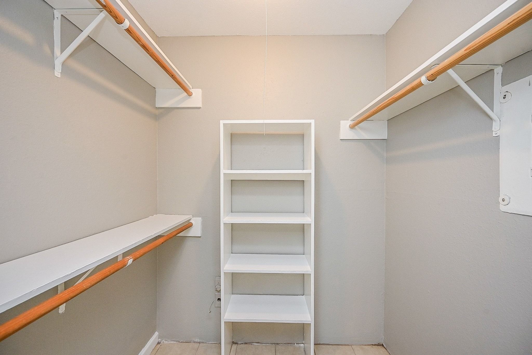 16303 Lyons School Road, Unit 703 Spring, TX 77379 - Photo 10 of 19 a hallway with closet