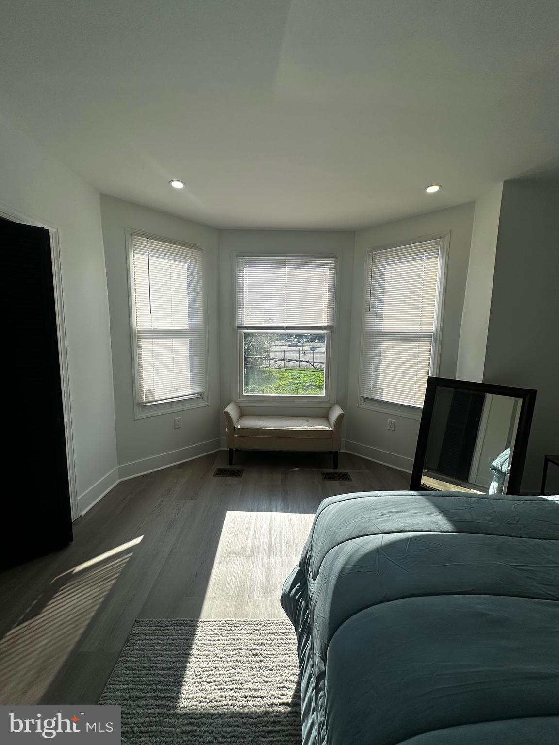 263 South 58th Street Philadelphia, PA 19139 - Photo 18 of 25 a bedroom with a bed and window