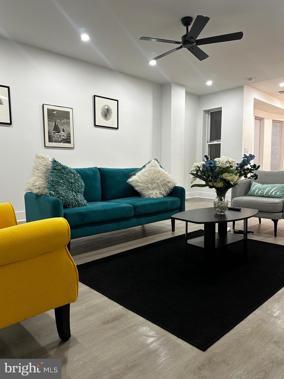 263 South 58th Street Philadelphia, PA 19139 - Photo 2 of 25 a living room with furniture and a rug