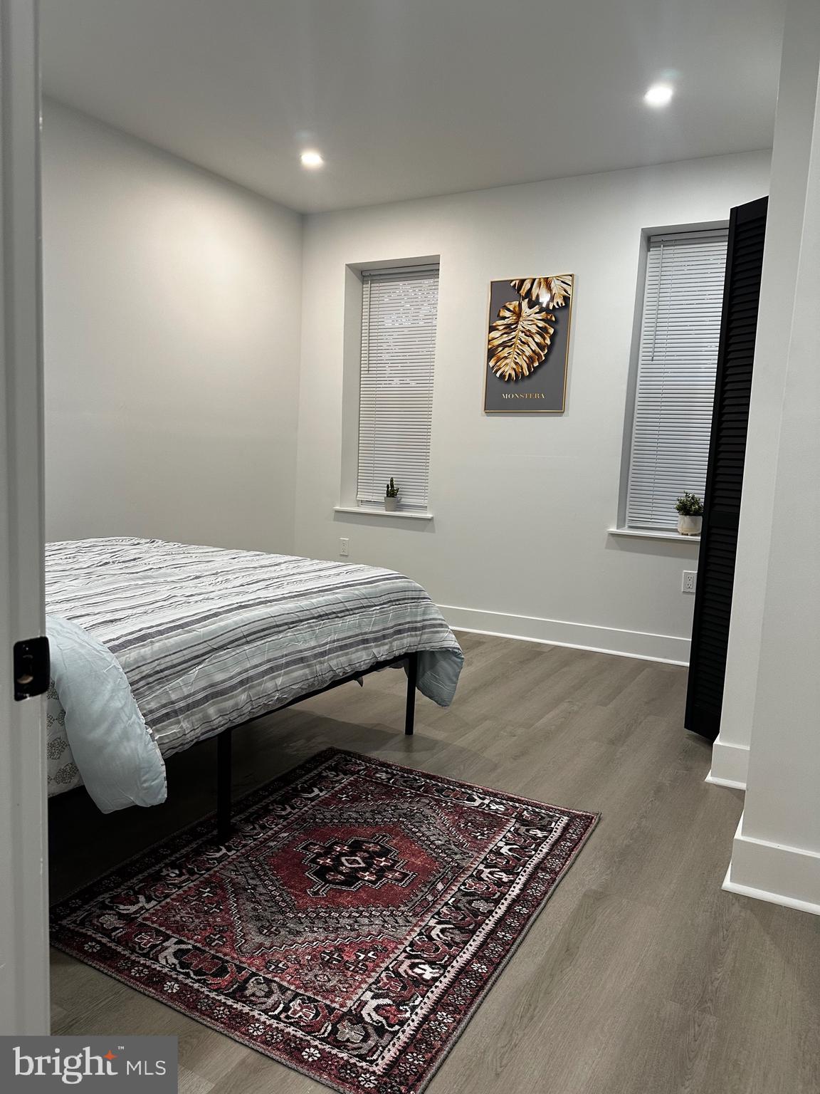 263 South 58th Street Philadelphia, PA 19139 - Photo 22 of 25 a room with wooden floor and pool table