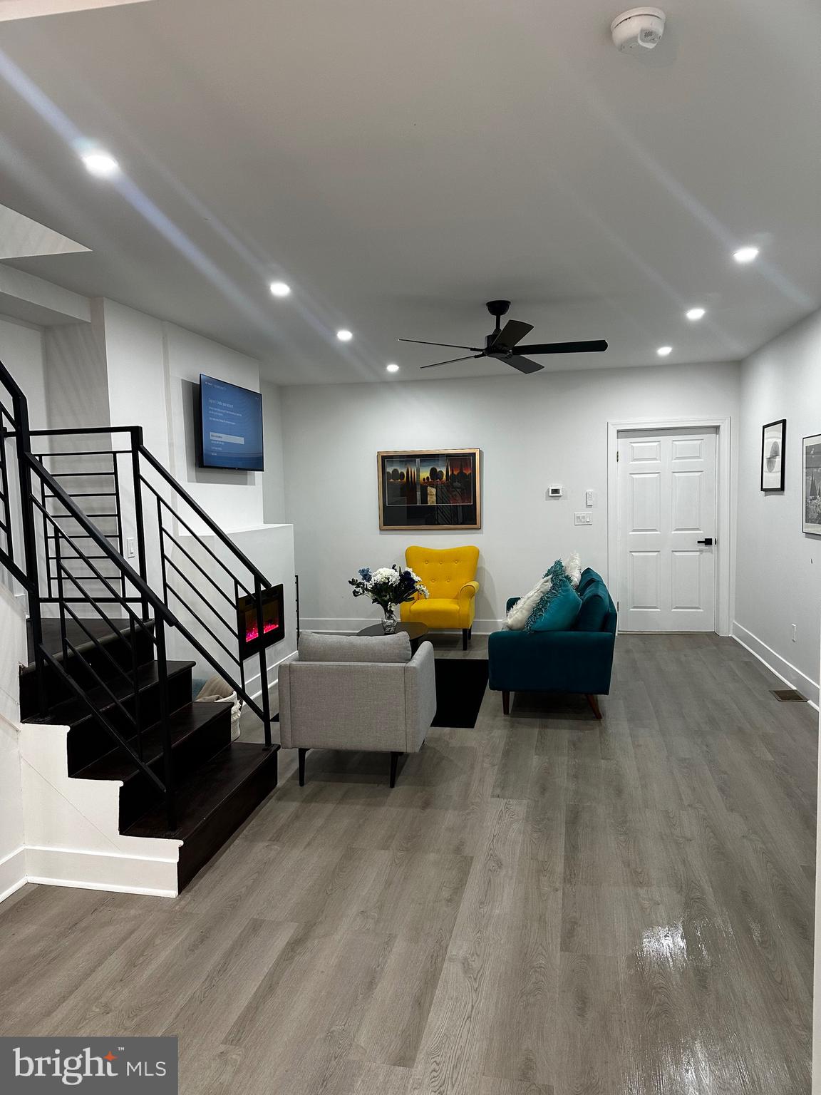 263 South 58th Street Philadelphia, PA 19139 - Photo 7 of 25 a living room with furniture and a flat screen tv