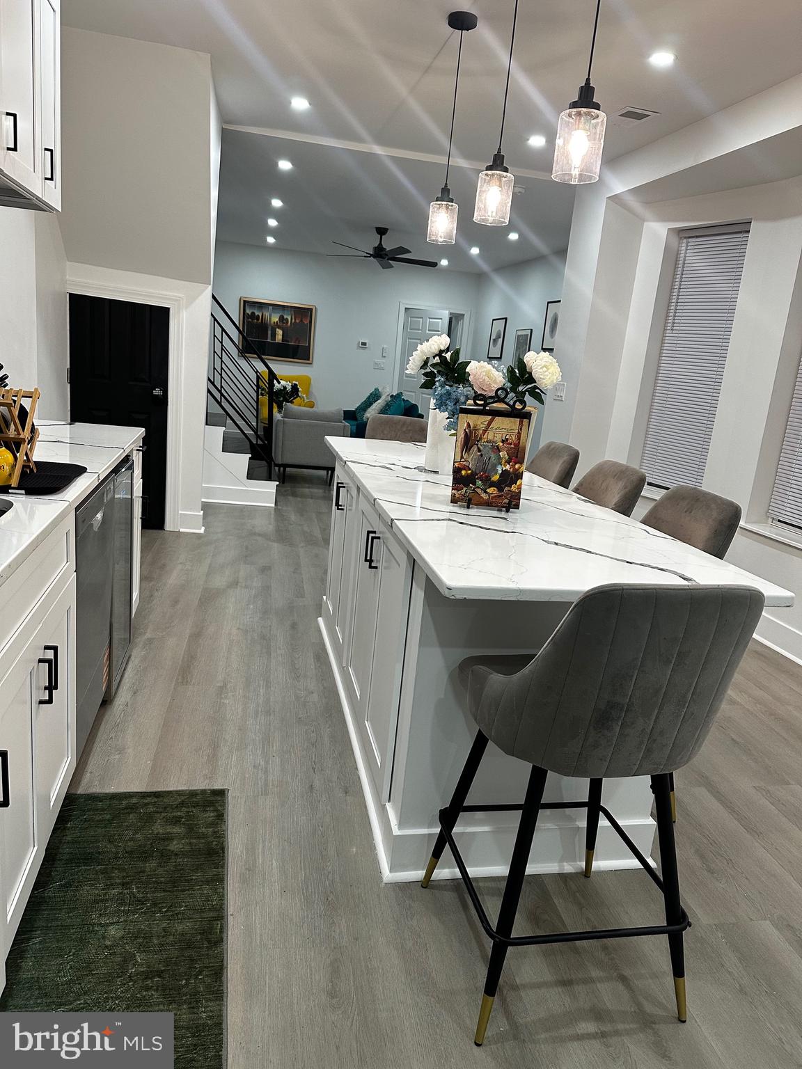 263 South 58th Street Philadelphia, PA 19139 - Photo 9 of 25 a large kitchen with a table and chairs