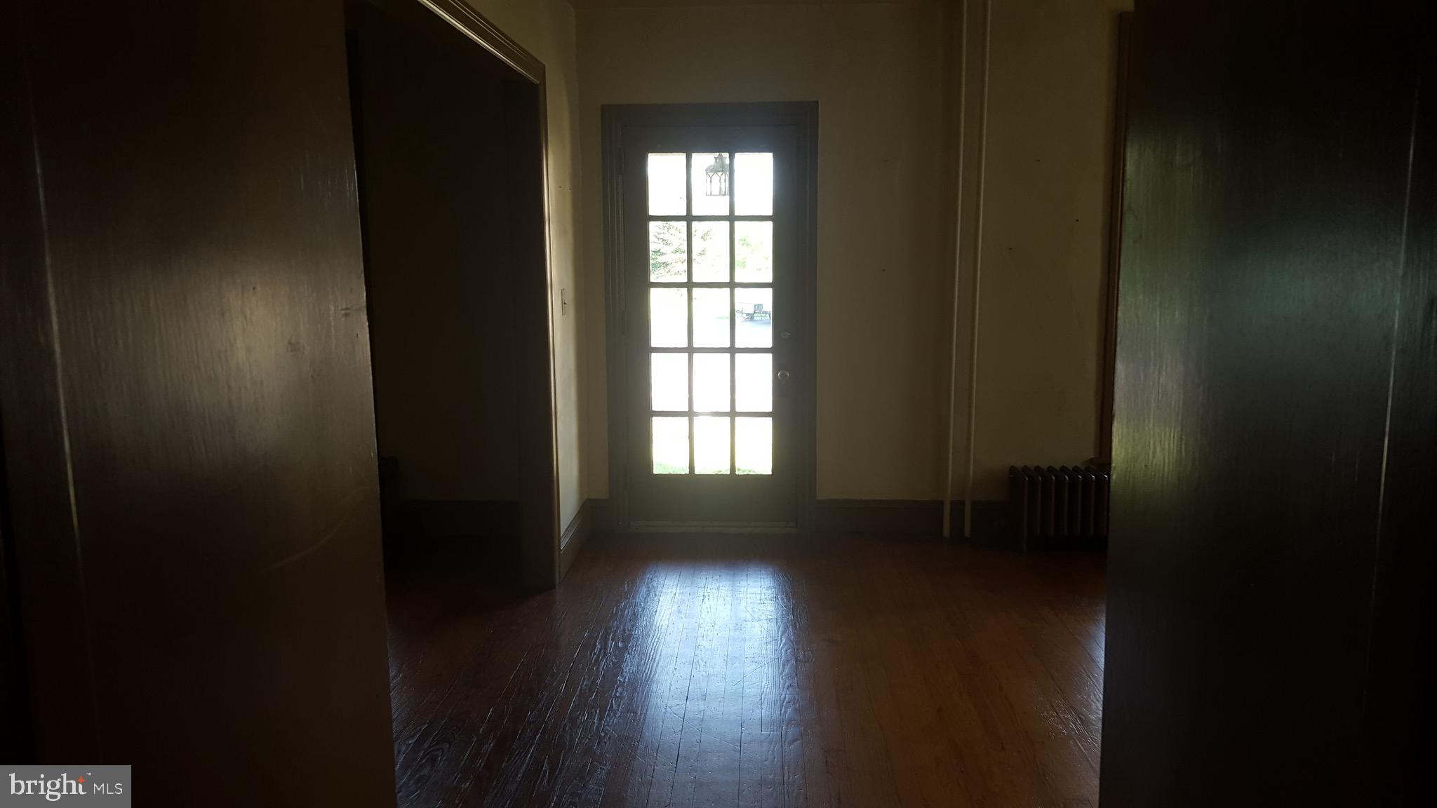 2902 Lower Saucon Road, Unit A&B Hellertown, PA 18055 - Photo 13 of 53 a view of empty room with wooden floor and fan