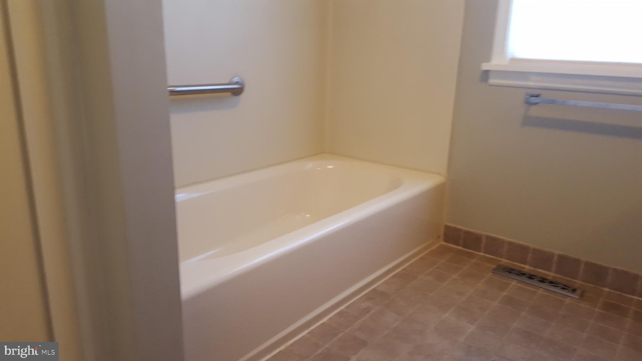 2902 Lower Saucon Road, Unit A&B Hellertown, PA 18055 - Photo 30 of 53 a bathroom with a bathtub