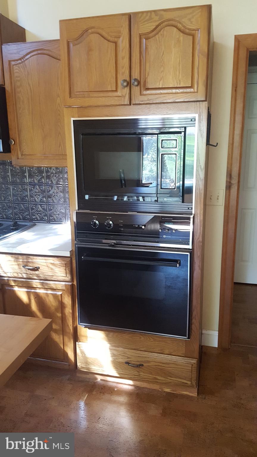 2902 Lower Saucon Road, Unit A&B Hellertown, PA 18055 - Photo 33 of 53 a stove top oven sitting inside of a kitchen