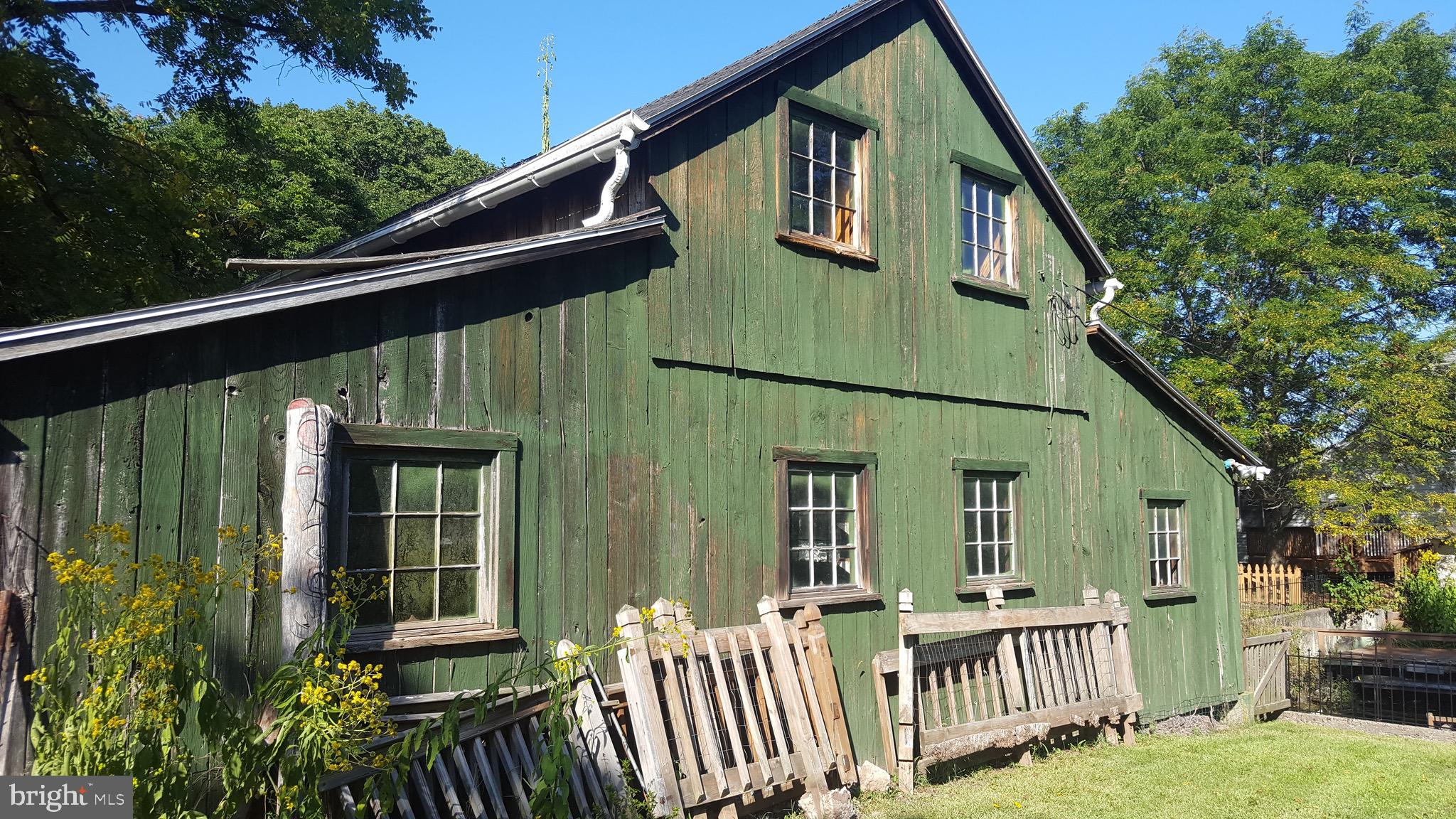 2902 Lower Saucon Road, Unit A&B Hellertown, PA 18055 - Photo 49 of 53 a front view of a house with a yard