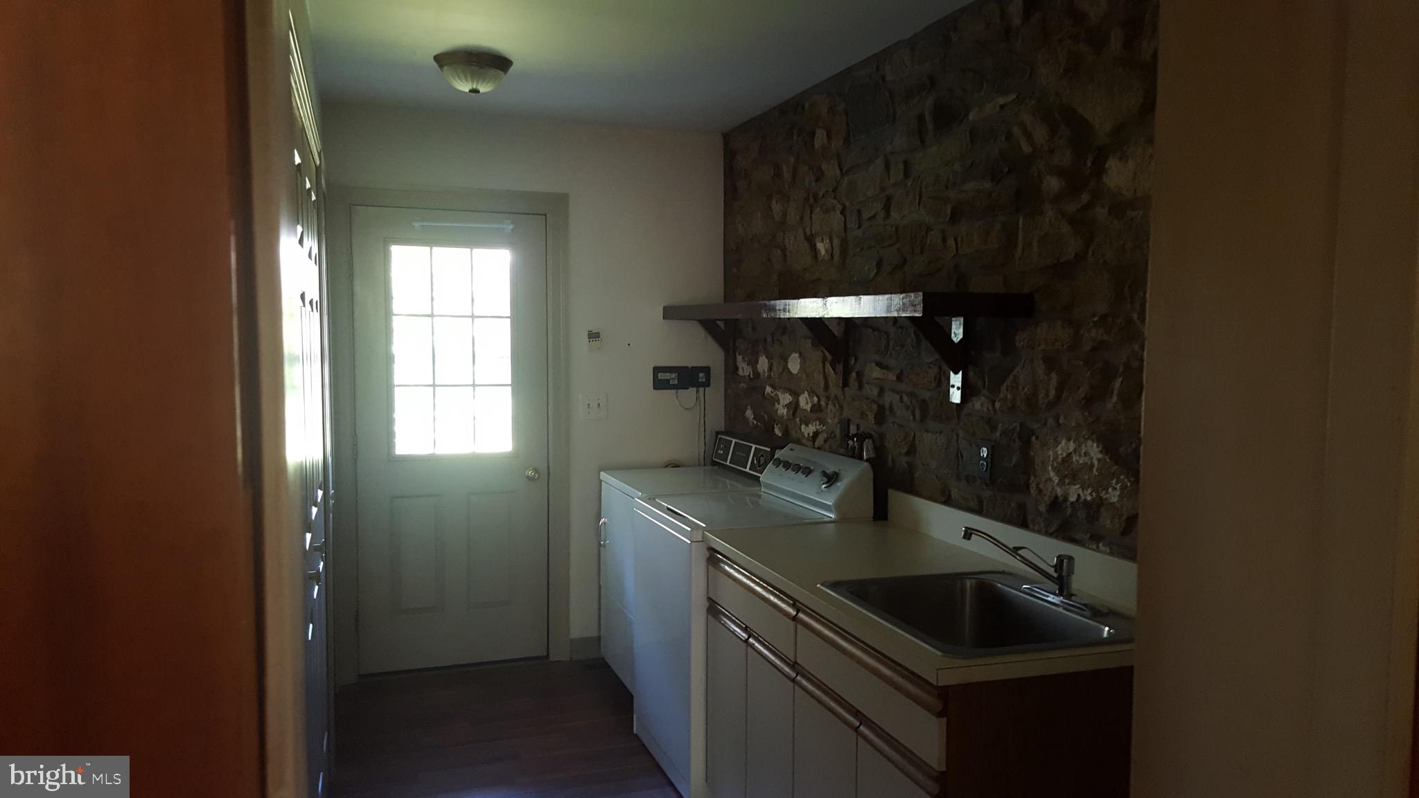 2902 Lower Saucon Road, Unit A&B Hellertown, PA 18055 - Photo 8 of 53 a kitchen with a sink and cabinets
