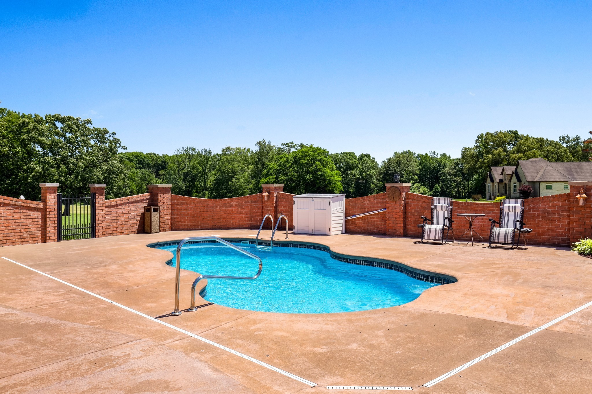 4984 Somerville Road Cross Plains, TN 37049 - Photo 20 of 57 a view of a swimming pool with a patio