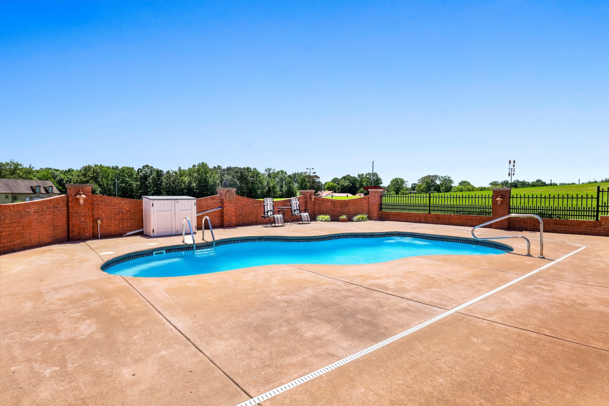 4984 Somerville Road Cross Plains, TN 37049 - Photo 21 of 57 a backyard of a house with outdoor seating