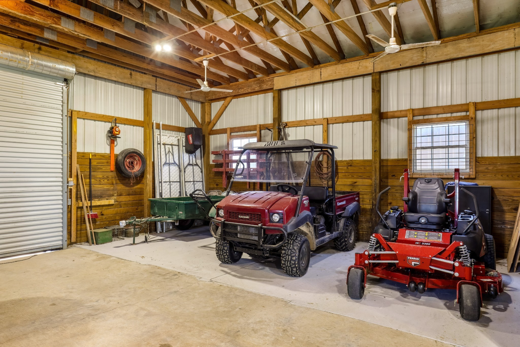 4984 Somerville Road Cross Plains, TN 37049 - Photo 30 of 57 a car is parked in a garage