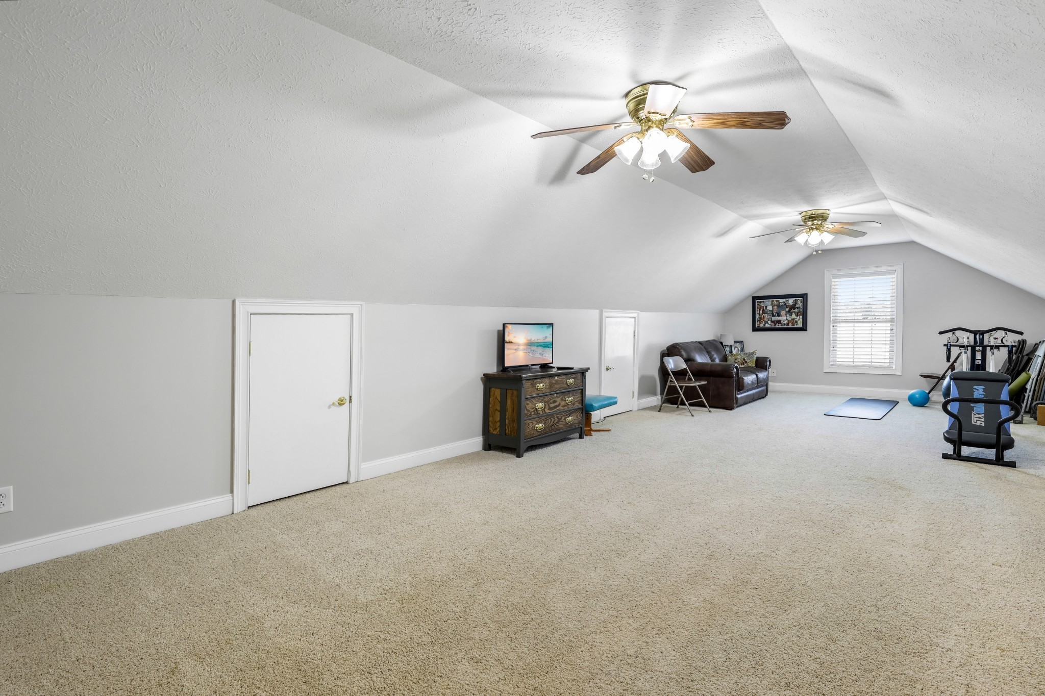 4984 Somerville Road Cross Plains, TN 37049 - Photo 33 of 57 a view of a livingroom with furniture and a ceiling fan