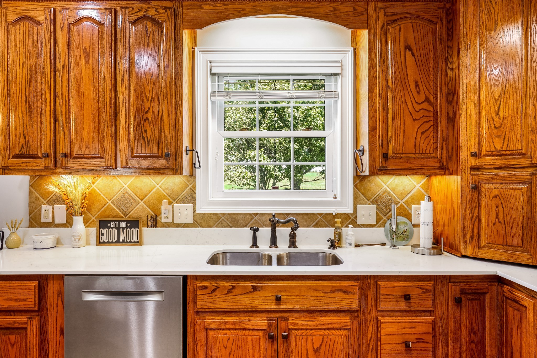 4984 Somerville Road Cross Plains, TN 37049 - Photo 40 of 57 a kitchen with stainless steel appliances granite countertop a sink and a white cabinets