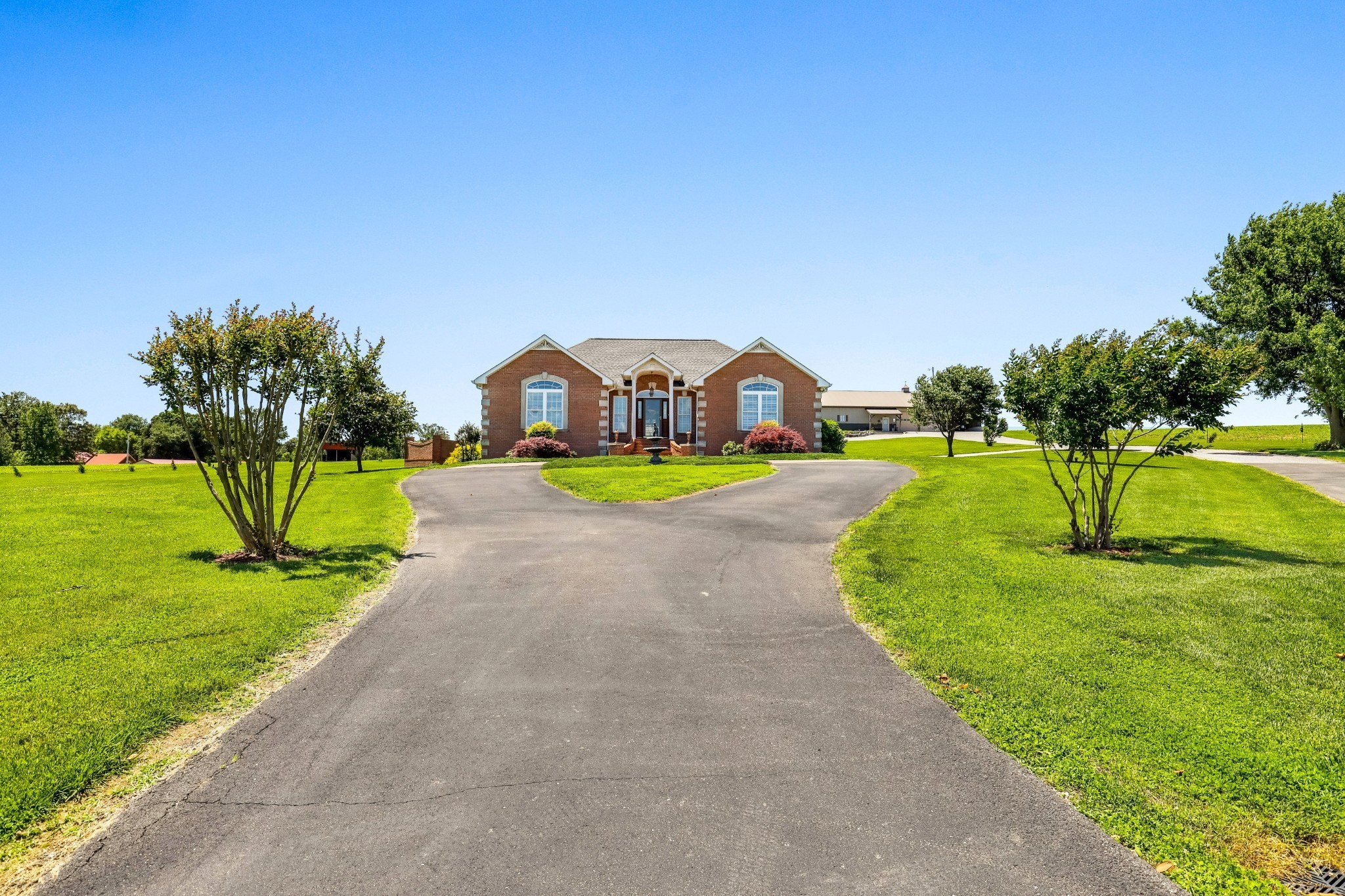4984 Somerville Road Cross Plains, TN 37049 - Photo 4 of 57 a view of a park with swings and slides