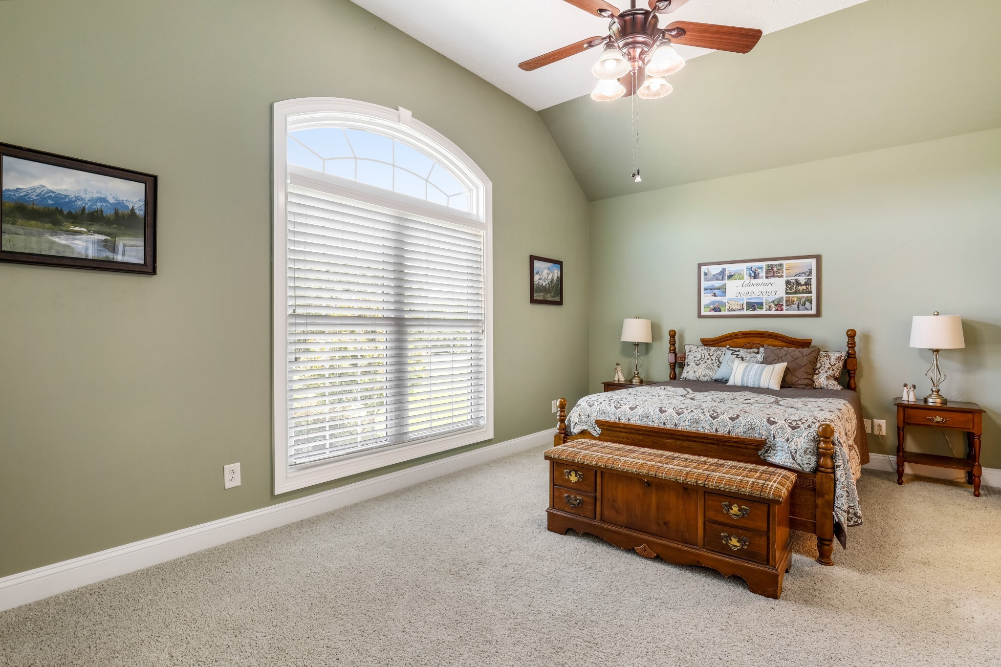 4984 Somerville Road Cross Plains, TN 37049 - Photo 50 of 57 a spacious bedroom with a bed and a chandelier