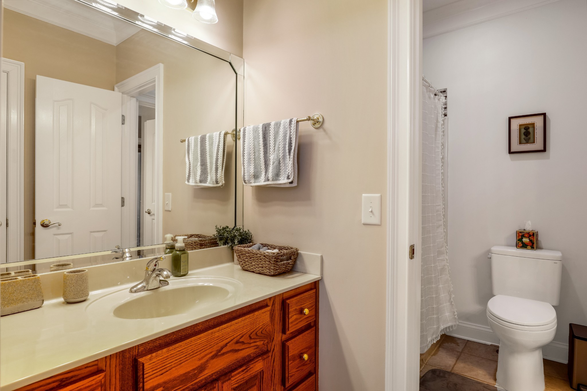 4984 Somerville Road Cross Plains, TN 37049 - Photo 52 of 57 a bathroom with a granite countertop sink toilet and shower