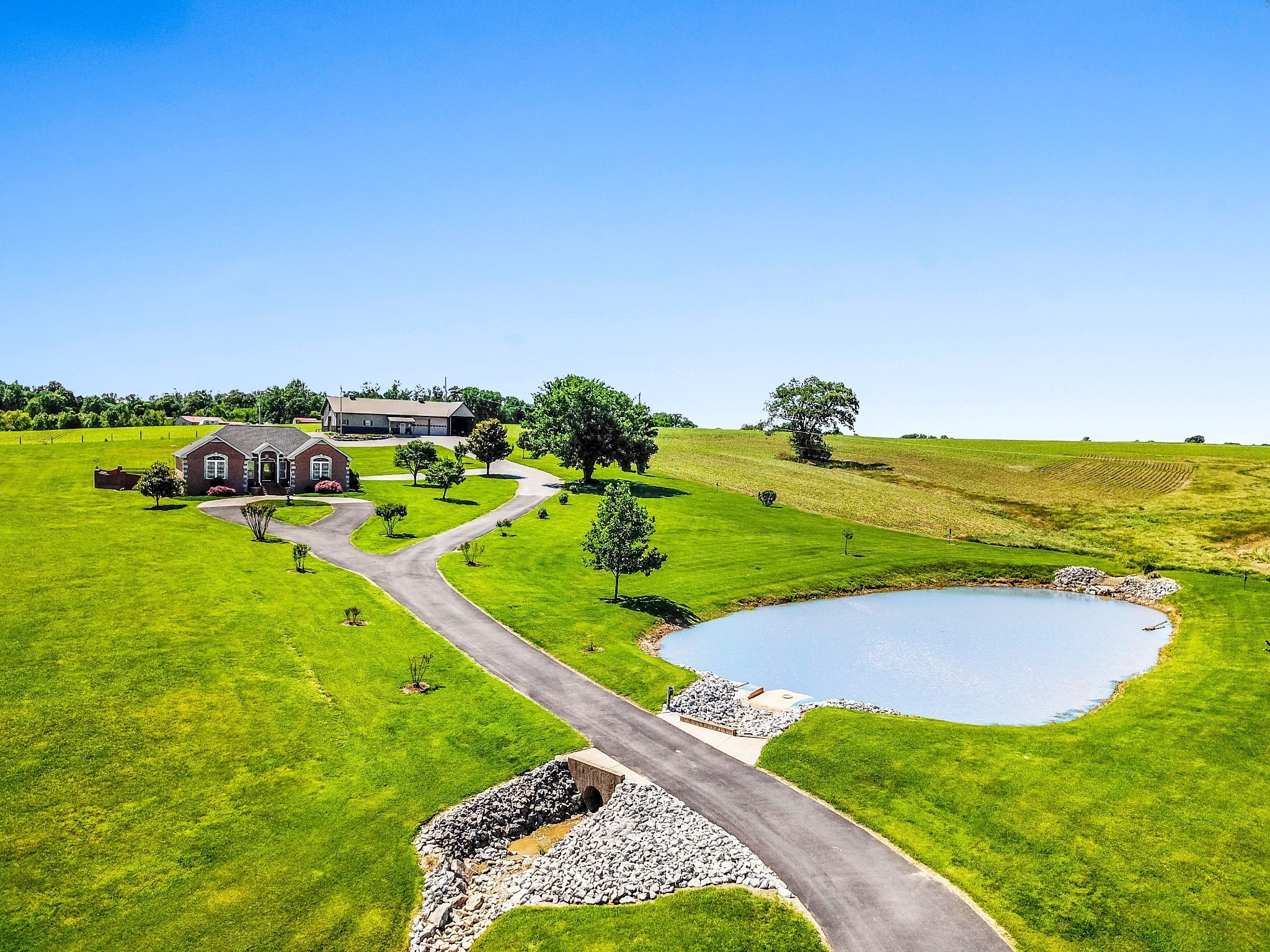 4984 Somerville Road Cross Plains, TN 37049 - Photo 7 of 57 a view of a lake with a yard